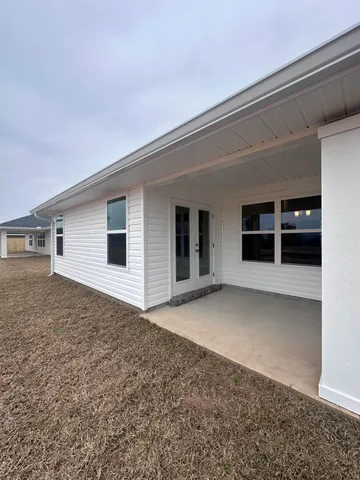 a view of house with garage