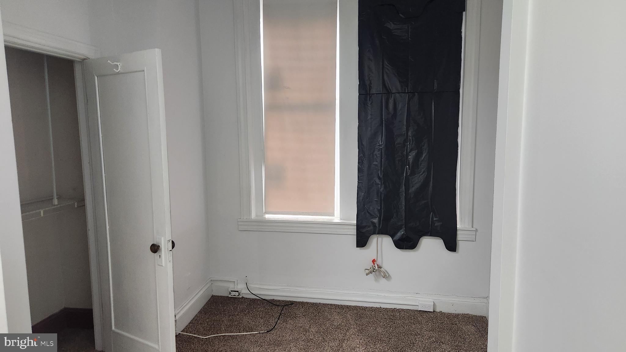 1115 North Calvert Street Baltimore, MD 21202 - Photo 12 of 35 a bathroom with a window