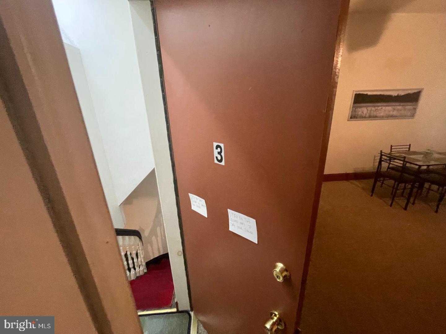 1115 North Calvert Street Baltimore, MD 21202 - Photo 16 of 35 a view of livingroom with furniture and a refrigerator