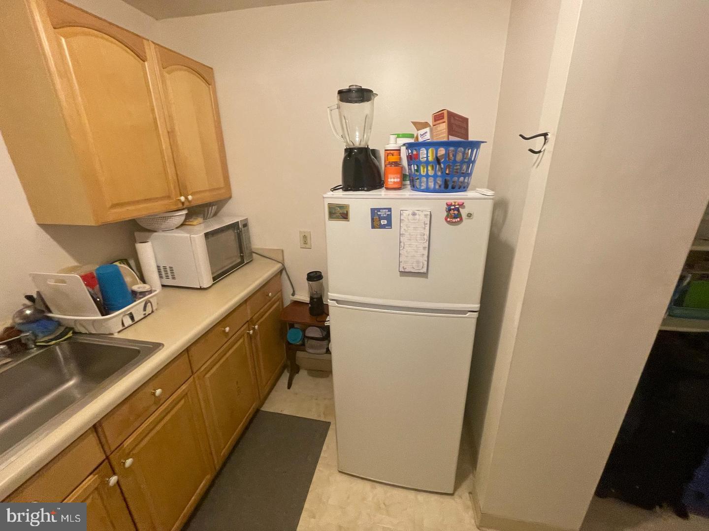 1115 North Calvert Street Baltimore, MD 21202 - Photo 19 of 35 a room with storage and utility