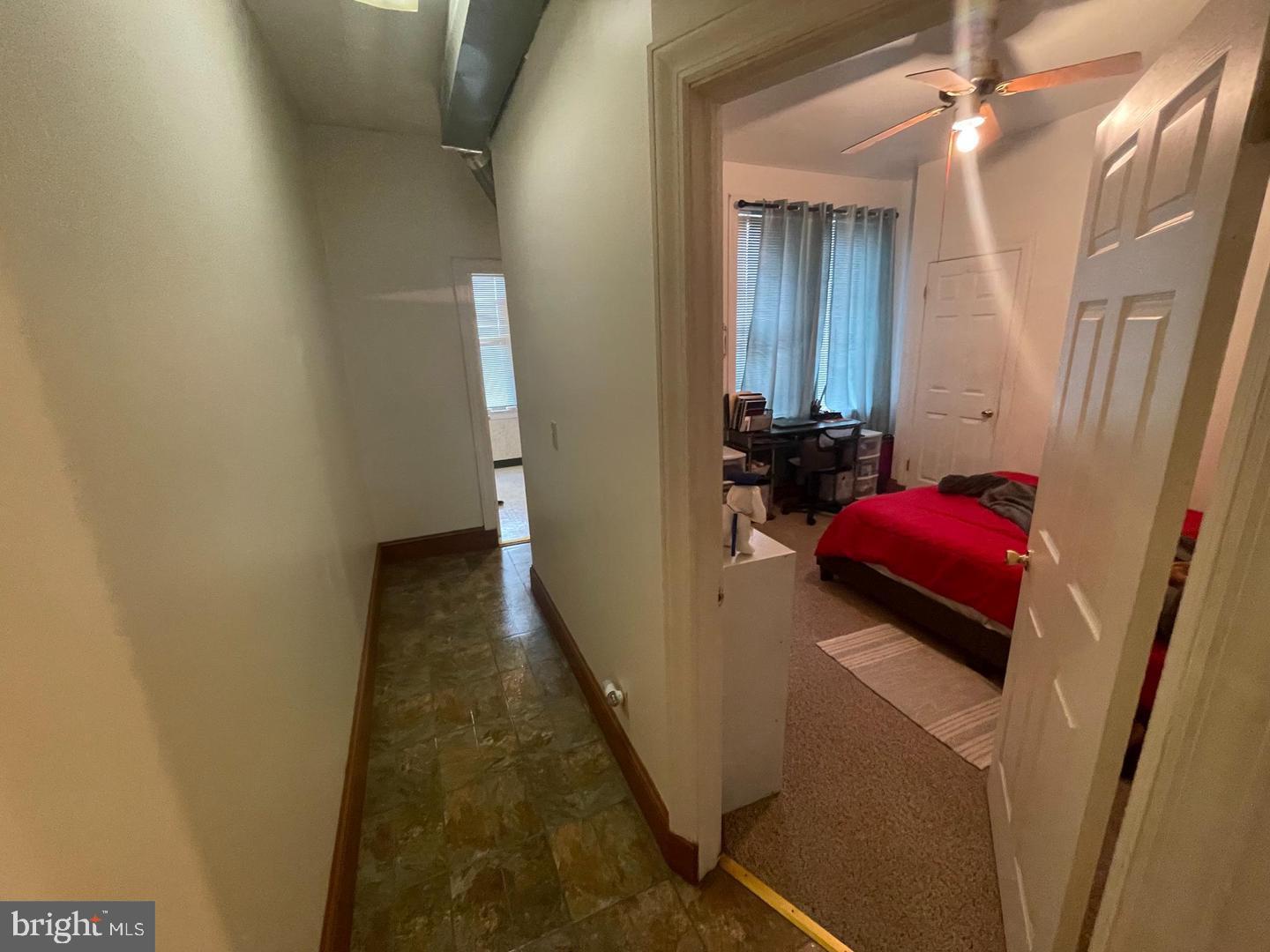 1115 North Calvert Street Baltimore, MD 21202 - Photo 22 of 35 a view of hallway with furniture