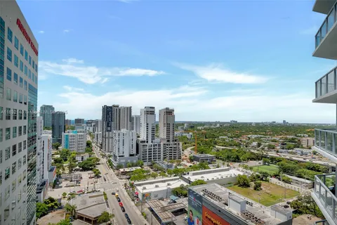 a view of a city with tall buildings