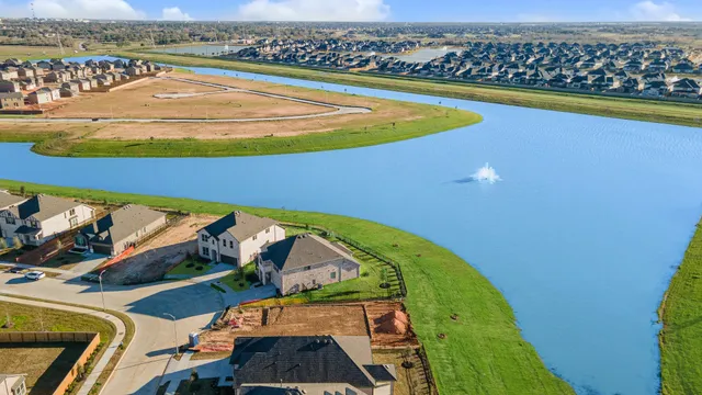 a view of a swimming pool and an outdoor space