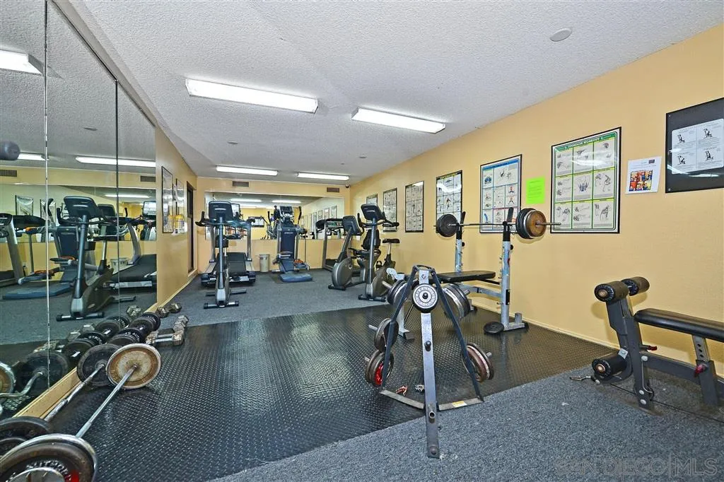 6046 Rancho Mission Road, Unit 384 San Diego, CA 92108 - Photo 16 of 18 a view of a room with gym equipment