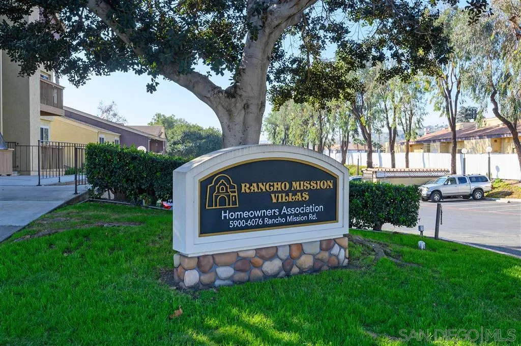 6046 Rancho Mission Road, Unit 384 San Diego, CA 92108 - Photo 18 of 18 a sign on the side of the road