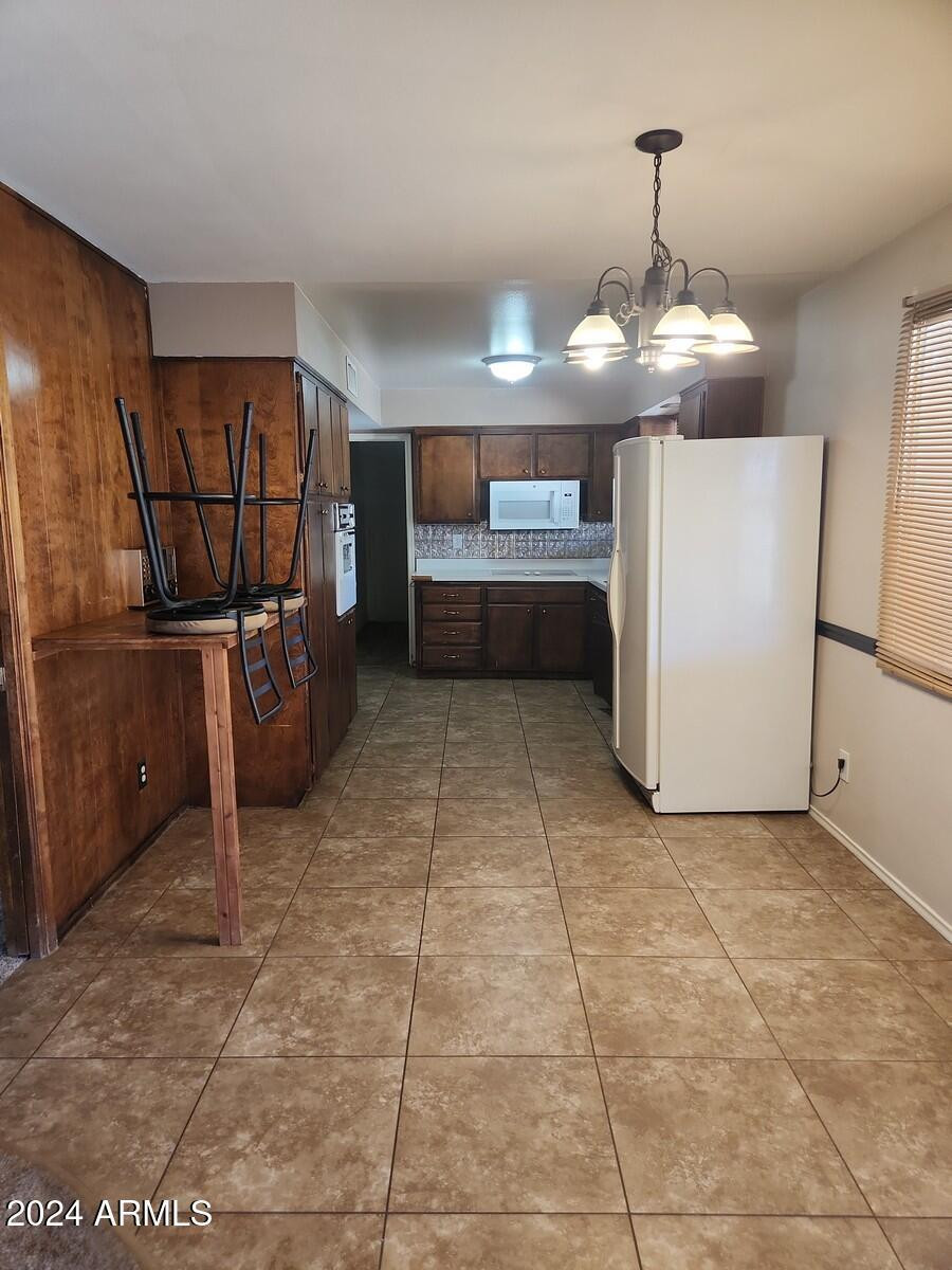 4330 West Royal Palm Road Glendale, AZ 85302 - Photo 4 of 21 a view of a storage & utility room with a sink