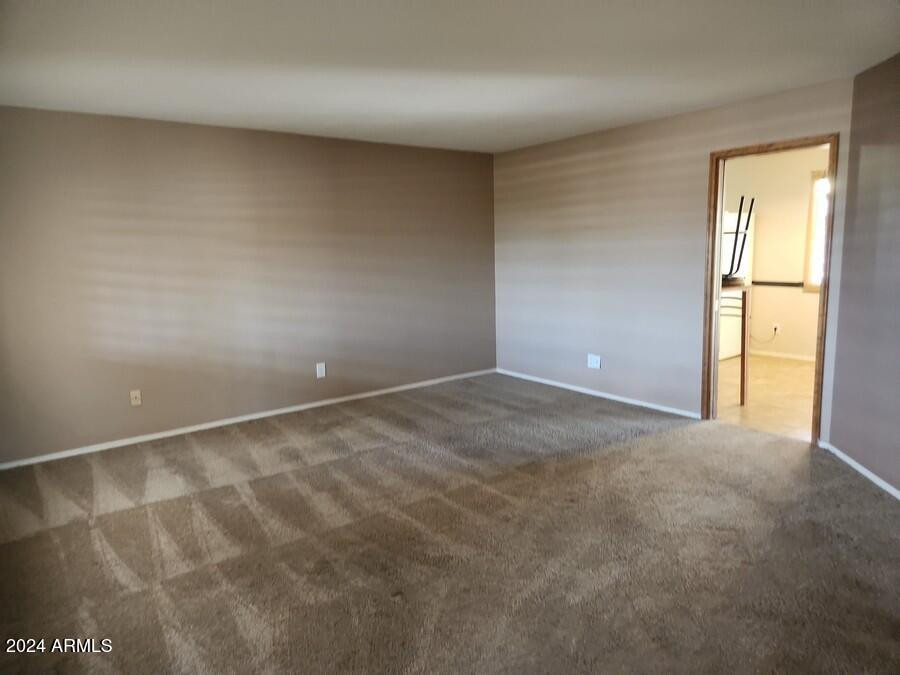 4330 West Royal Palm Road Glendale, AZ 85302 - Photo 7 of 21 an empty room with windows
