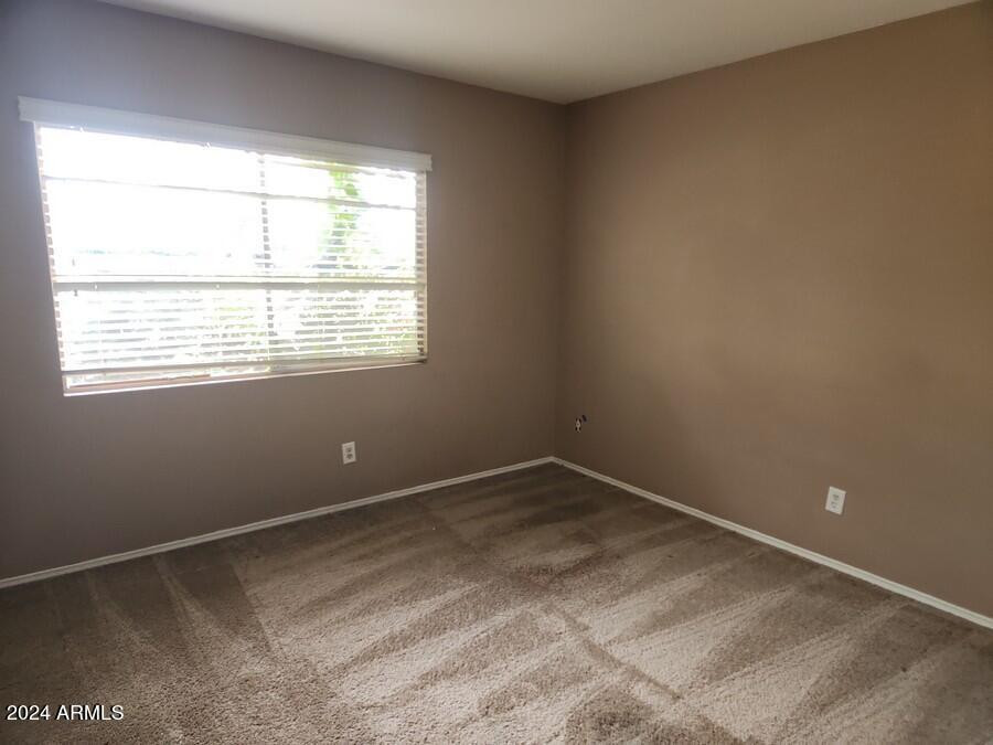 4330 West Royal Palm Road Glendale, AZ 85302 - Photo 9 of 21 a view of a room with a window