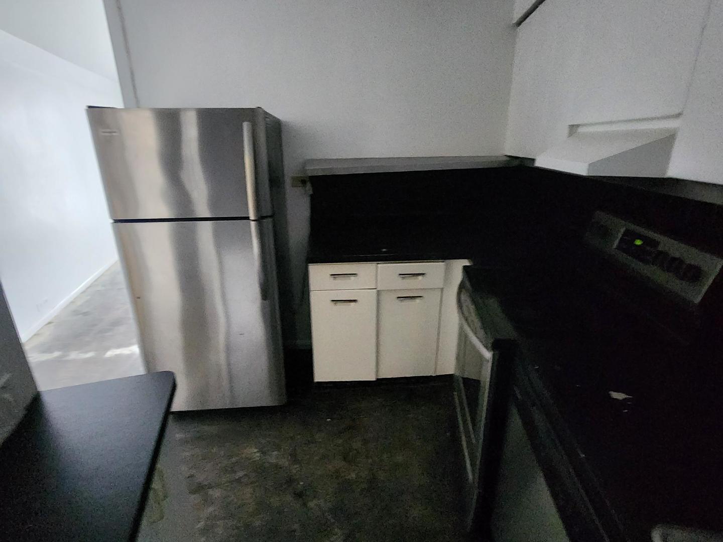 300 North State Street, Unit 4629 Chicago, IL 60654 - Photo 8 of 10 a view of cabinets