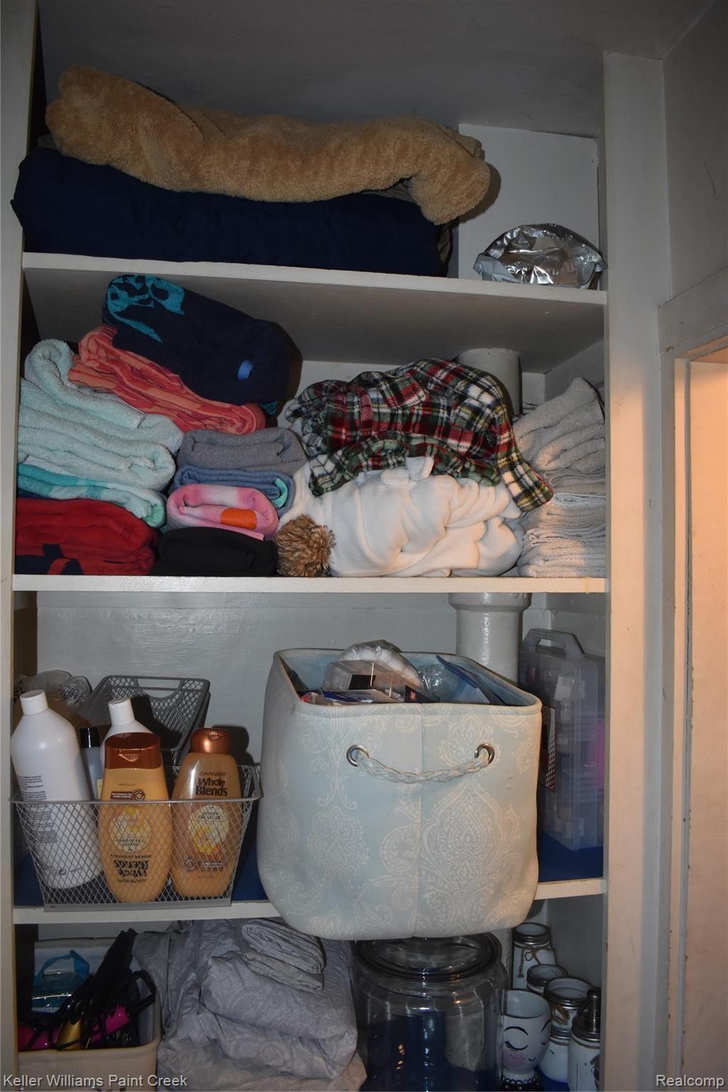 3116 Kenmore Road Berkley, MI 48072 - Photo 22 of 29 THE WALK-IN CLOSET IN THE 2ND FLOOR BATH CONTAINS NUMEROUS SHELVES. ALSO THERE IS ANOTHER STORAGE AREA TO THE RIGHT OF THE SHELF AREA
