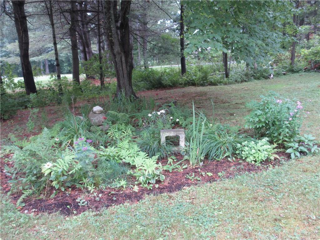 74 Winthrop Road Readfield, ME 04355 - Photo 5 of 35 Front flower bed