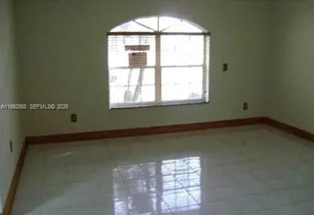 an empty room with a window