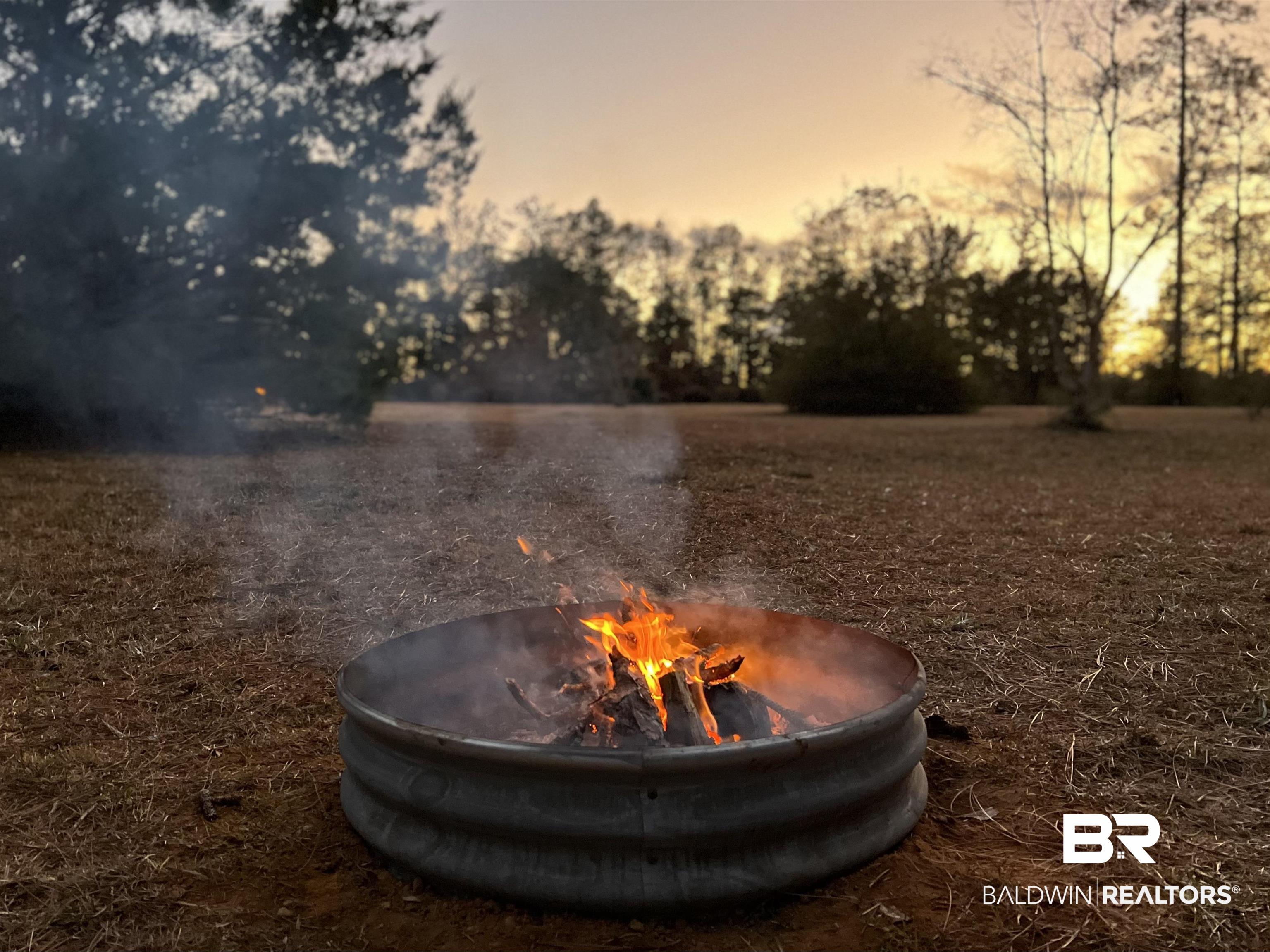 47580 Rabun Road Bay Minette, AL 36507 - Photo 55 of 55 Exterior details with a fire pit