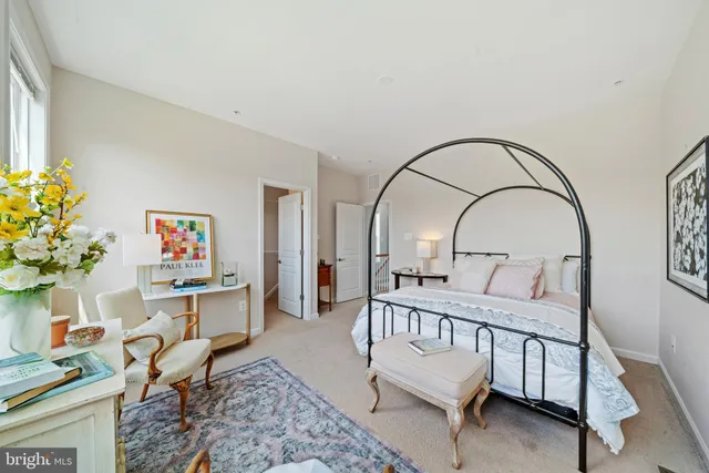 a bathroom with a granite countertop sink toilet a large mirror a bathtub and shower