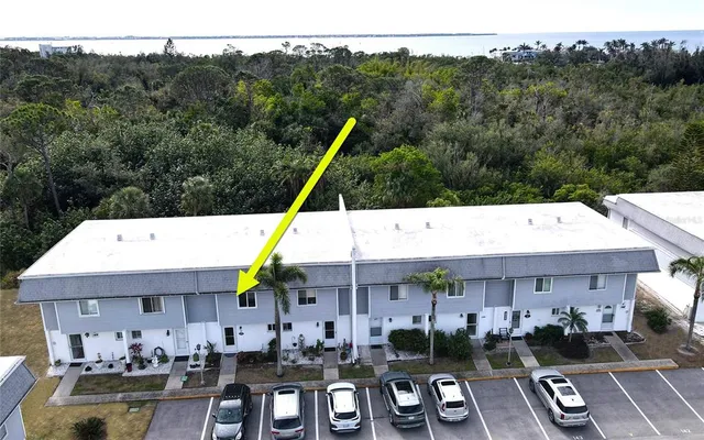 a view of house with outdoor space patio and mountain view