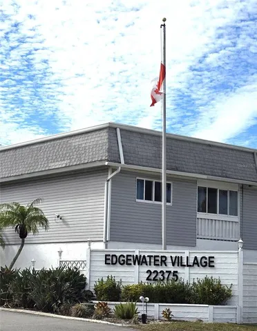 a view of a patio with couches table and chairs