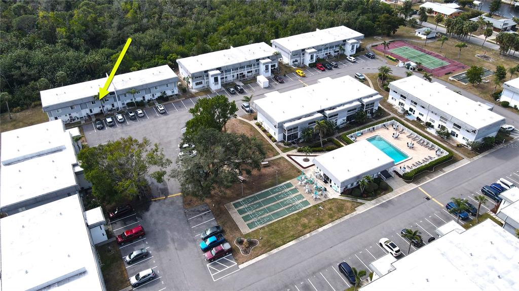 22375 Edgewater Drive, Unit 147 Punta Gorda, FL 33980 - Photo 27 of 31 an aerial view of a house with a swimming pool