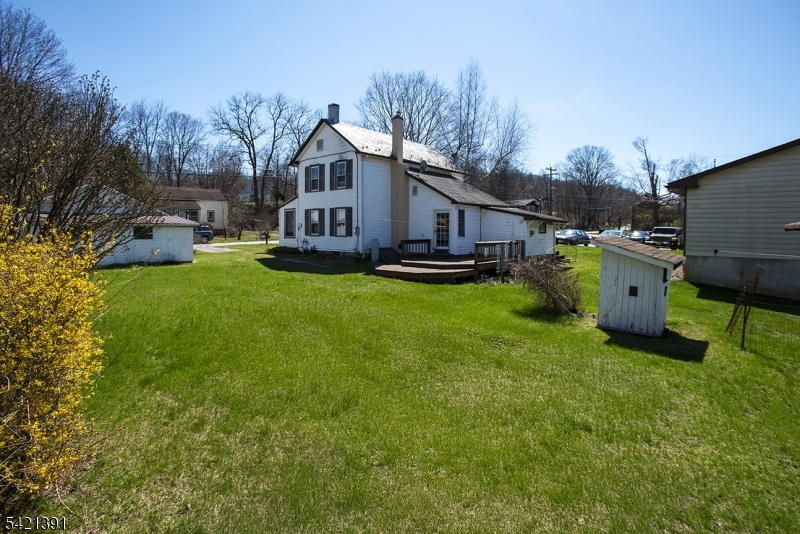 13 Ice Plant Road Lafayette, NJ 07848 - Photo 17 of 19 a front view of house with yard and garage