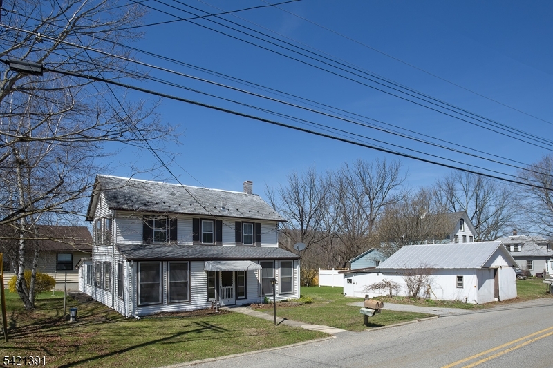 13 Ice Plant Road Lafayette, NJ 07848 - Photo 19 of 19 a view of a big house with a yard and large trees