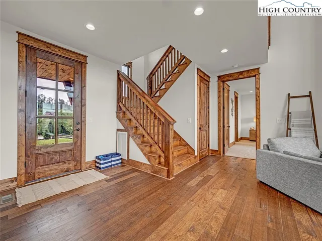 a view of cabinets and wooden floor