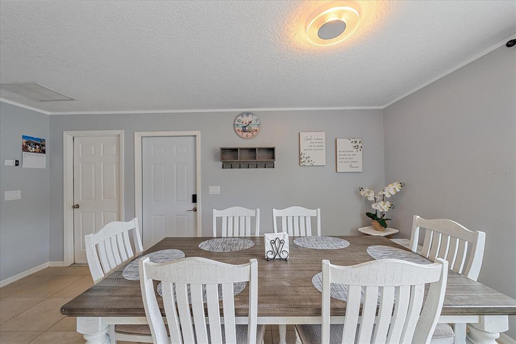 772 Locklear Avenue Sarasota, FL 34237 - Photo 19 of 40 a view of a dining room with furniture
