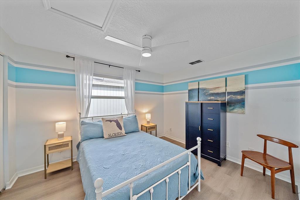 772 Locklear Avenue Sarasota, FL 34237 - Photo 37 of 40 a bedroom with a bed and a closet