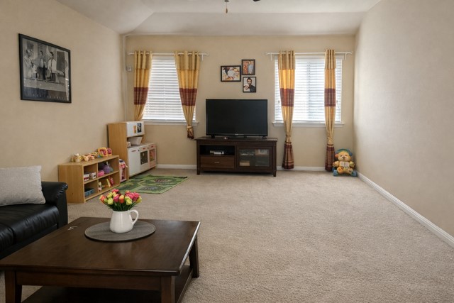 11613 Reading Court Austin, TX 78717 - Photo 9 of 16 a living room with furniture and a flat screen tv