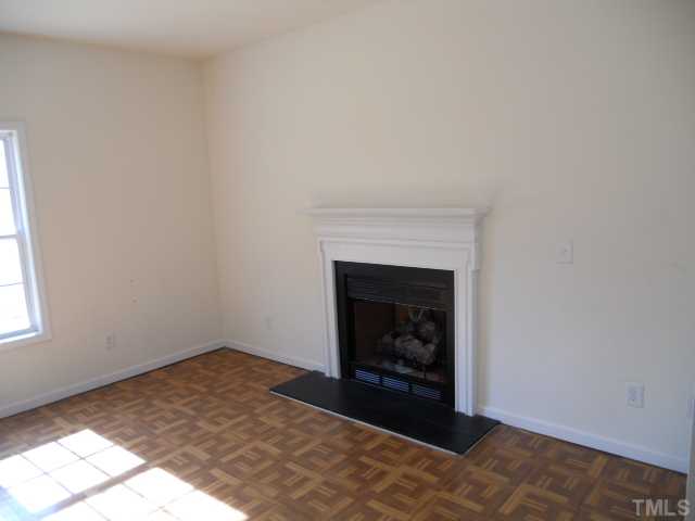 3517 Rendition Street Raleigh, NC 27610 - Photo 3 of 9 a view of a livingroom with a fireplace
