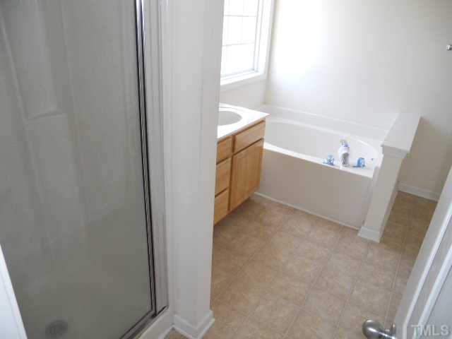 3517 Rendition Street Raleigh, NC 27610 - Photo 6 of 9 a view of an empty room with a window