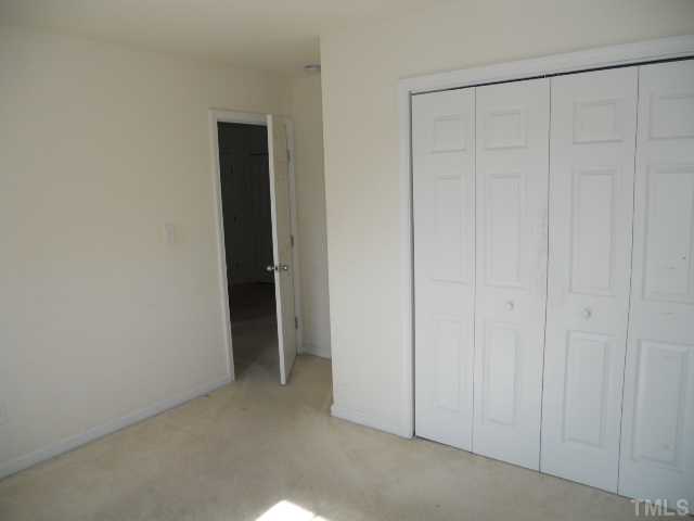 3517 Rendition Street Raleigh, NC 27610 - Photo 7 of 9 a view of an empty room with closet