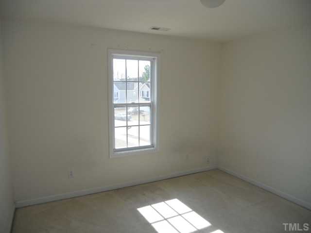 3517 Rendition Street Raleigh, NC 27610 - Photo 9 of 9 an empty room with a window