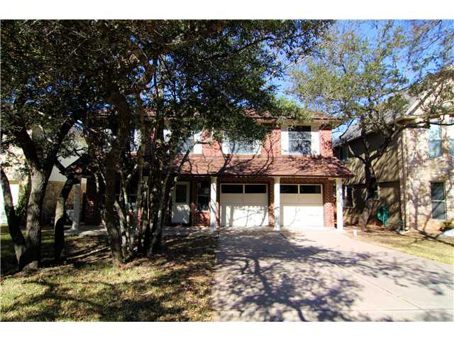 7402 Potters Trail Austin, TX 78729 - Photo 1 of 1 a front view of a house with a yard