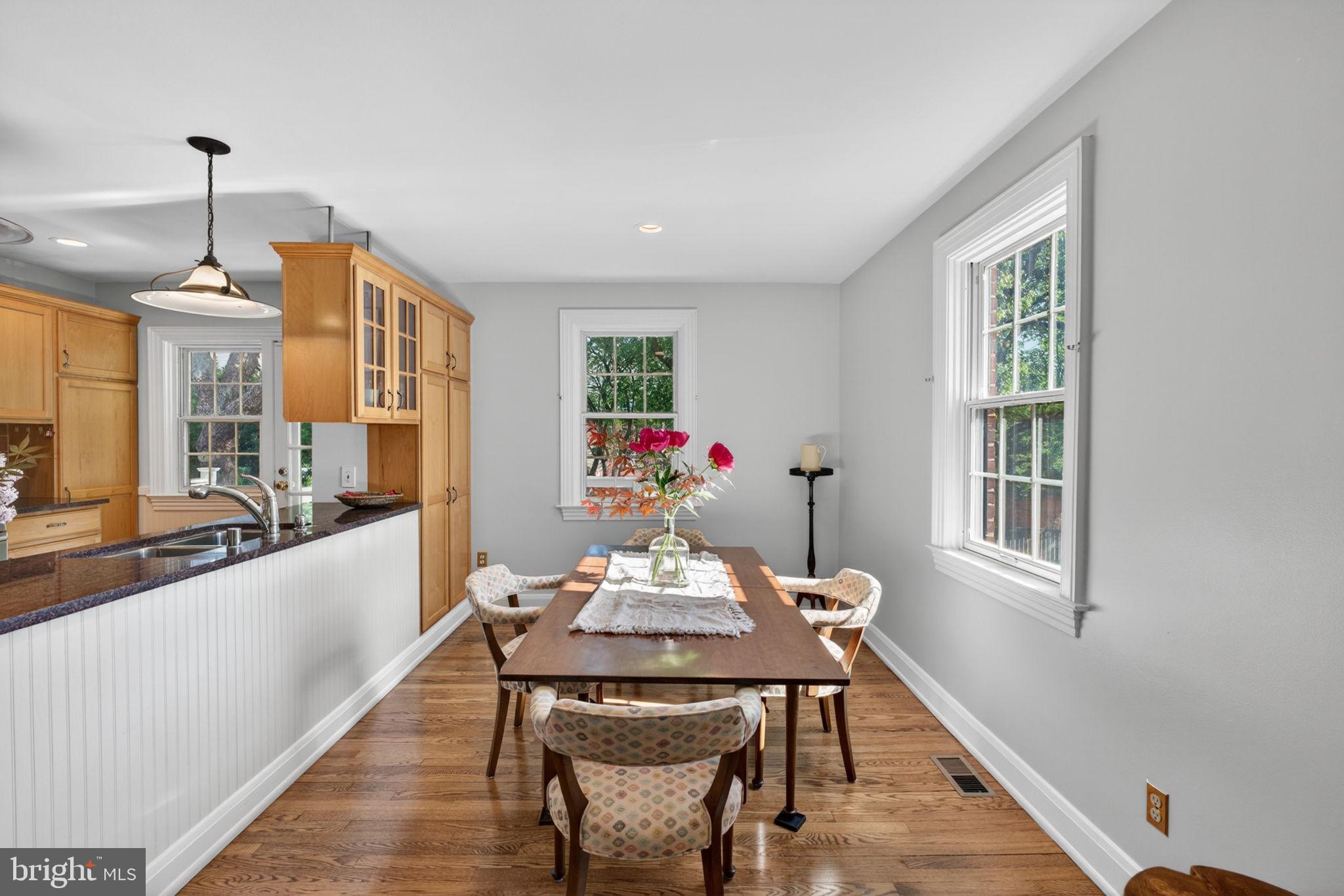 158 Hopkins Road Baltimore, MD 21212 - Photo 17 of 68 a view of a dining room with furniture window and wooden floor