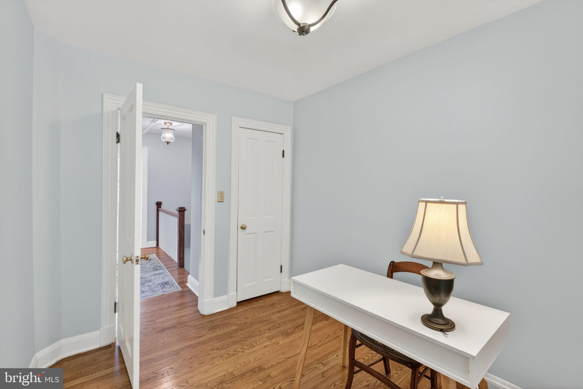 158 Hopkins Road Baltimore, MD 21212 - Photo 25 of 68 a view of a workspace with furniture and wooden floor