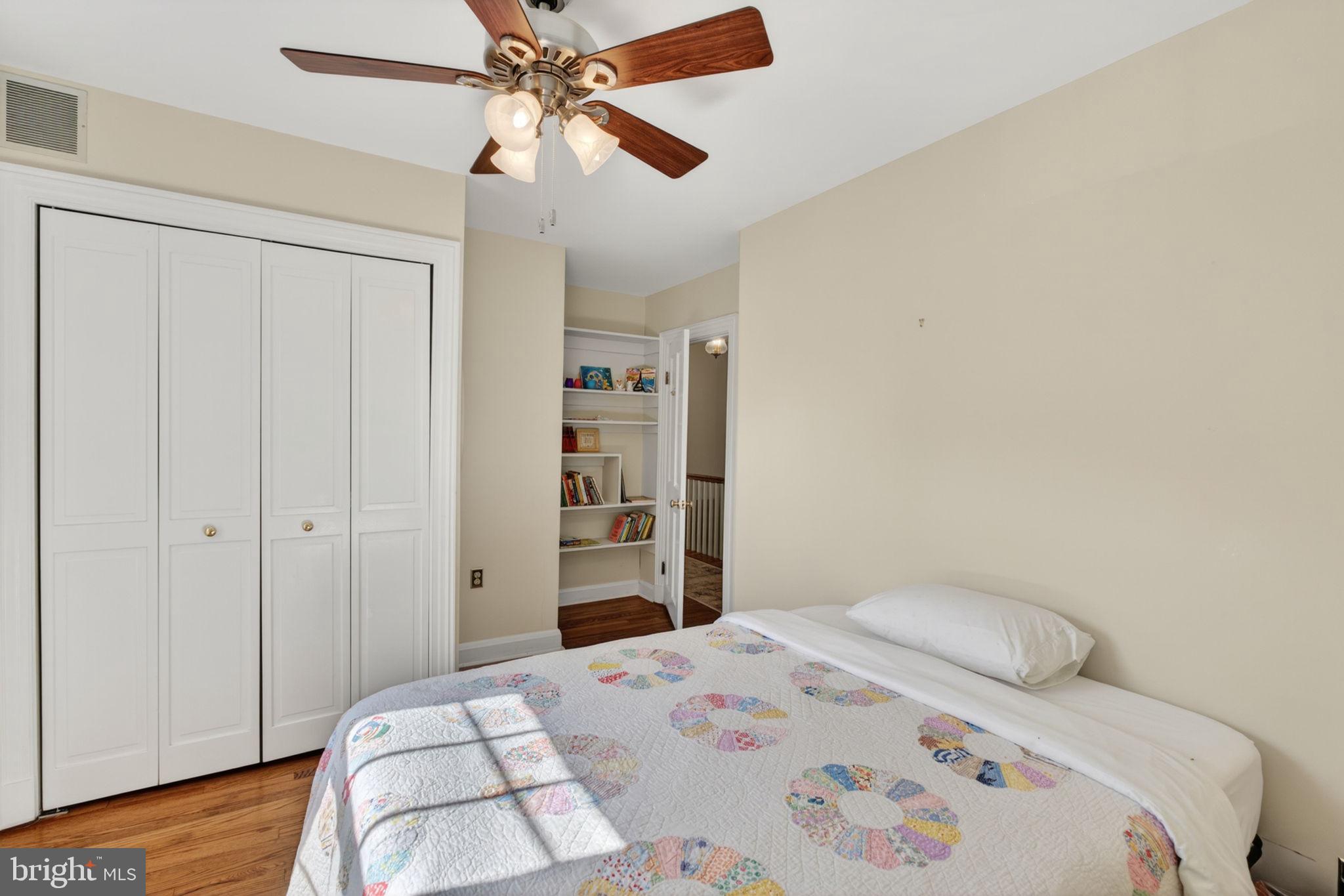 158 Hopkins Road Baltimore, MD 21212 - Photo 27 of 68 a bedroom with a bed and a closet