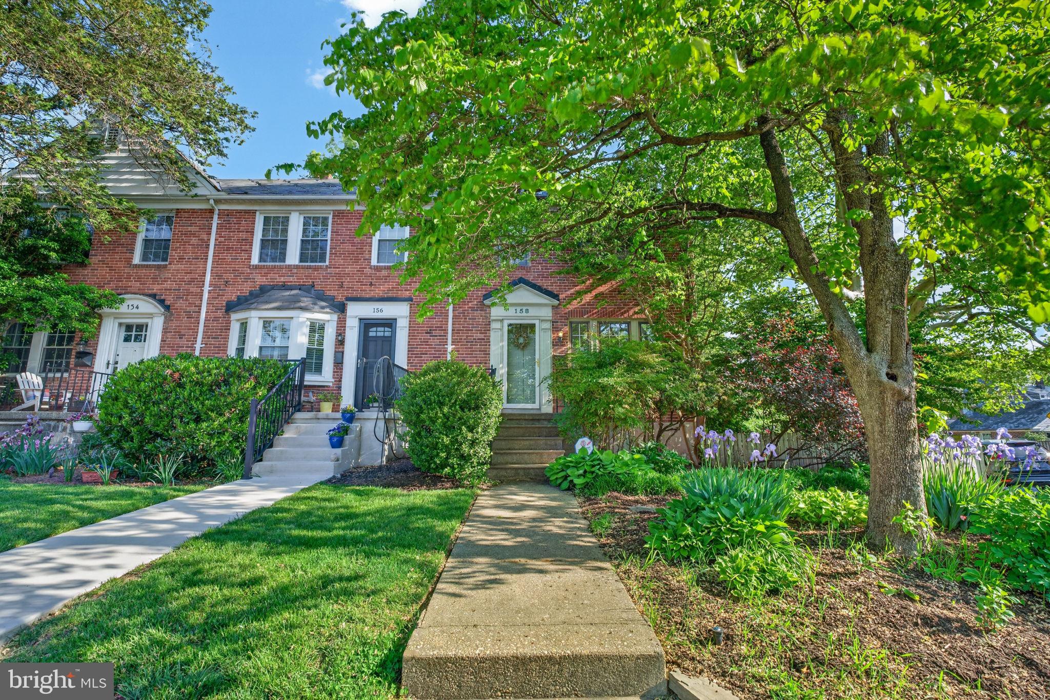 158 Hopkins Road Baltimore, MD 21212 - Photo 3 of 68 a front view of a house with a garden
