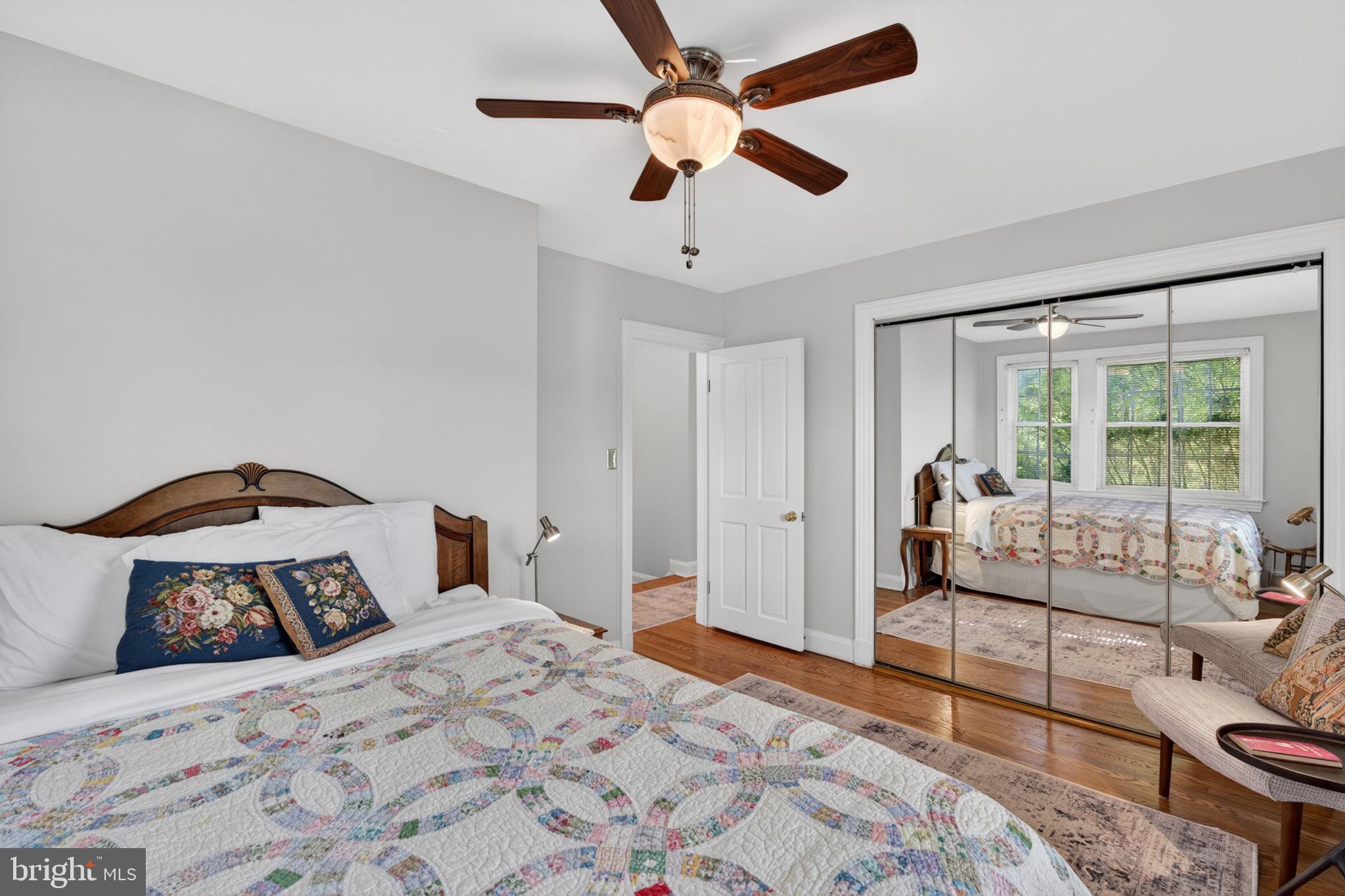 158 Hopkins Road Baltimore, MD 21212 - Photo 31 of 68 a bedroom with a bed and a large window