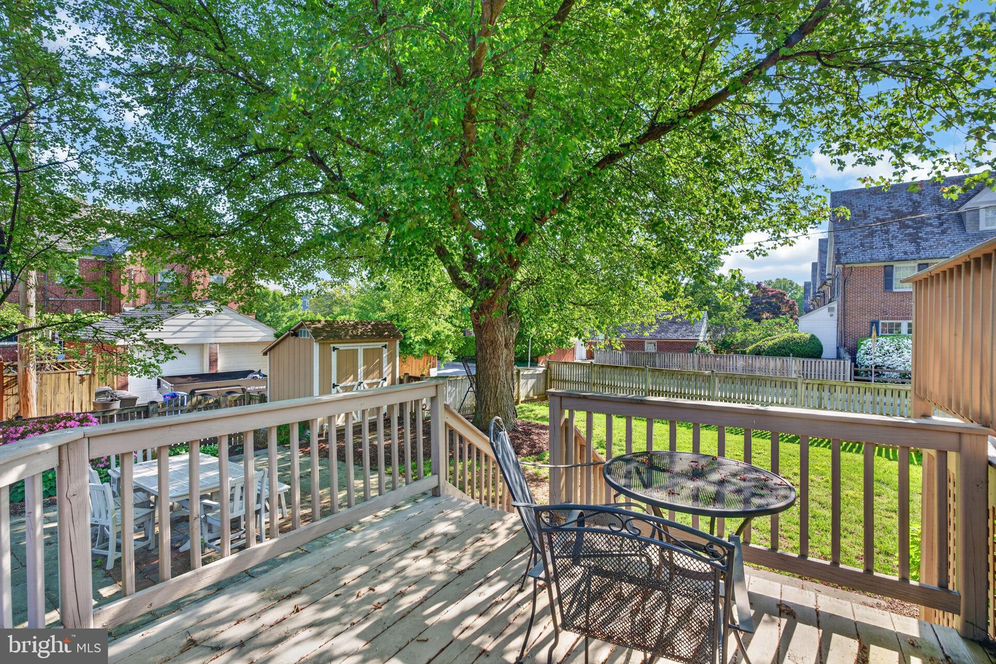 158 Hopkins Road Baltimore, MD 21212 - Photo 44 of 68 a view of a chair and table on the deck