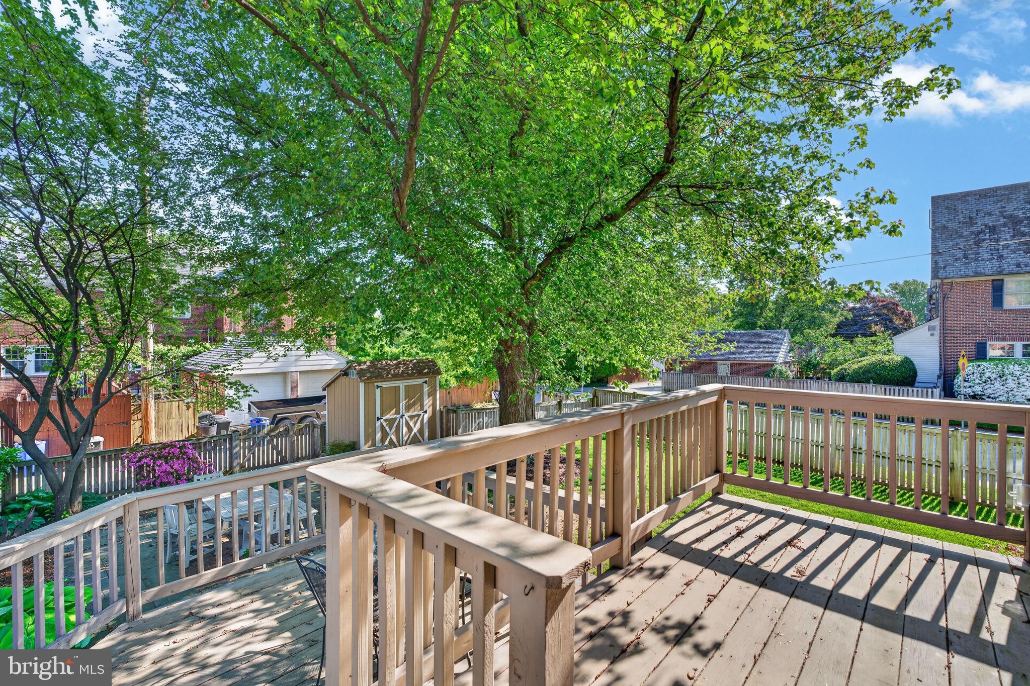 158 Hopkins Road Baltimore, MD 21212 - Photo 45 of 68 a view of a roof deck with wooden floor and fence