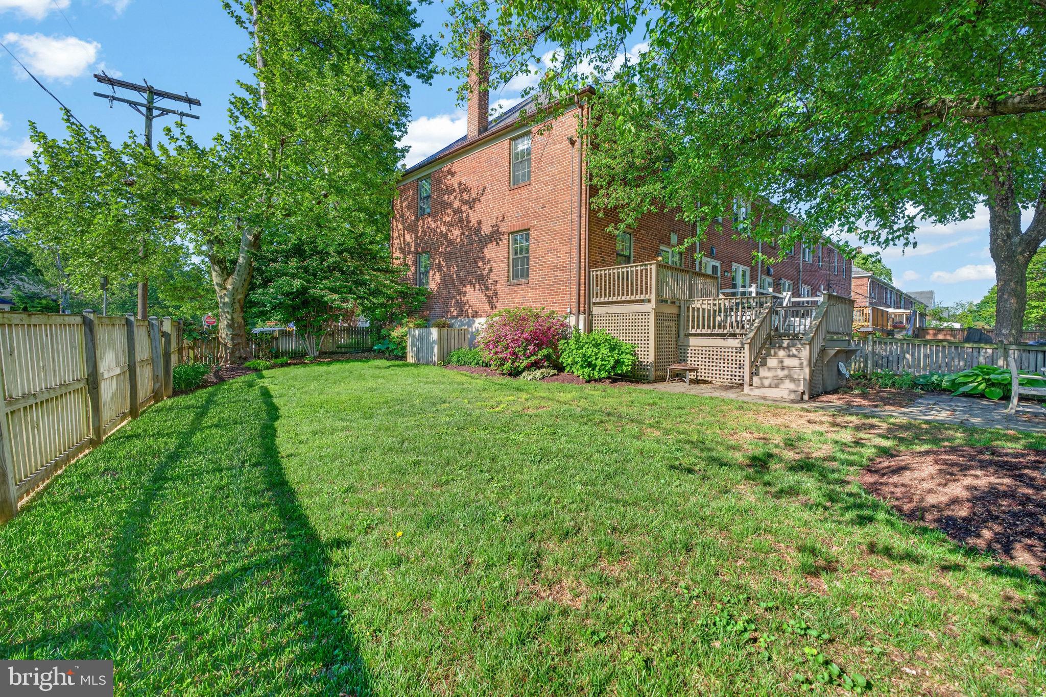 158 Hopkins Road Baltimore, MD 21212 - Photo 48 of 68 Lush backyard oasis with vibrant greenery.