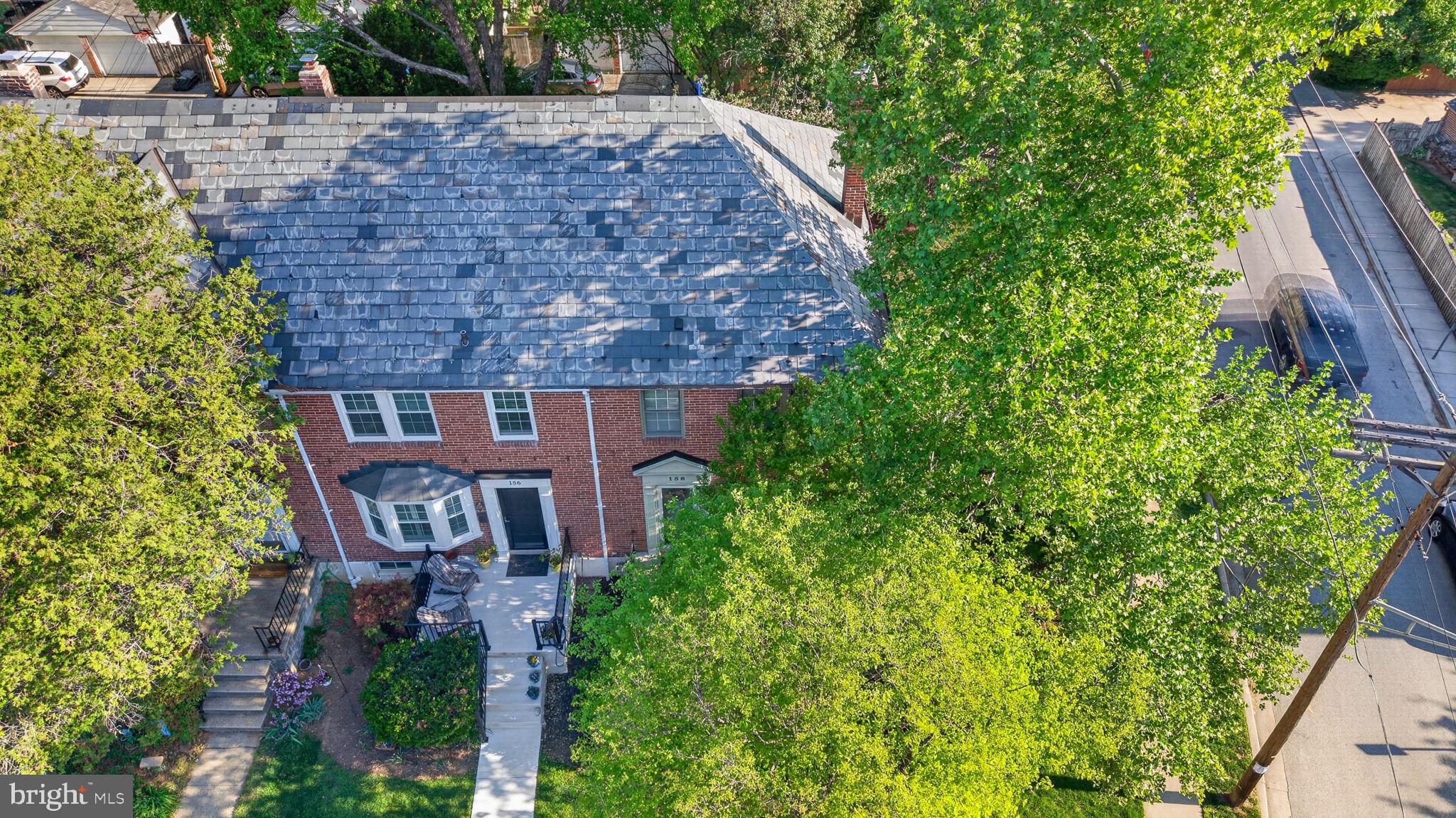 158 Hopkins Road Baltimore, MD 21212 - Photo 58 of 68 a aerial view of a house with garden space and trees
