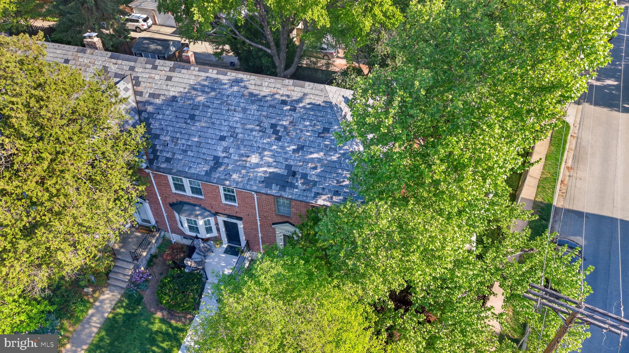 158 Hopkins Road Baltimore, MD 21212 - Photo 59 of 68 Charming brick home embraced by greenery.