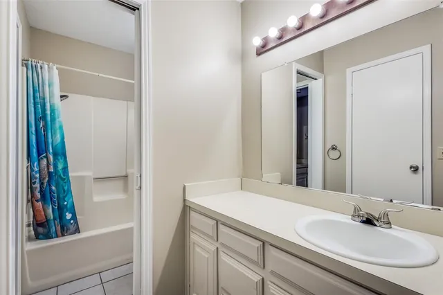 a view of a room with wooden walls