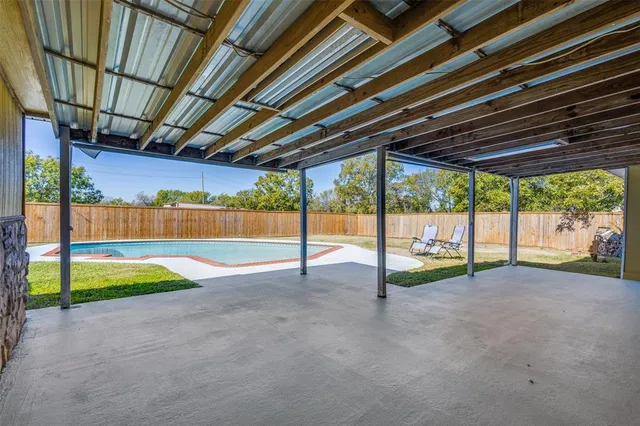 a view of outdoor space yard and swimming pool