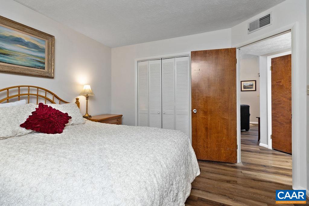 453 3 Ridges Roseland, VA 22967 - Photo 13 of 21 a bedroom with a bed and wooden floor