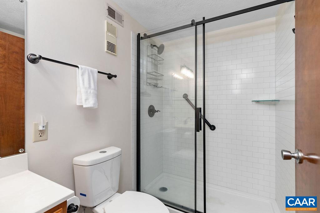 453 3 Ridges Roseland, VA 22967 - Photo 14 of 21 a bathroom with a shower and a toilet