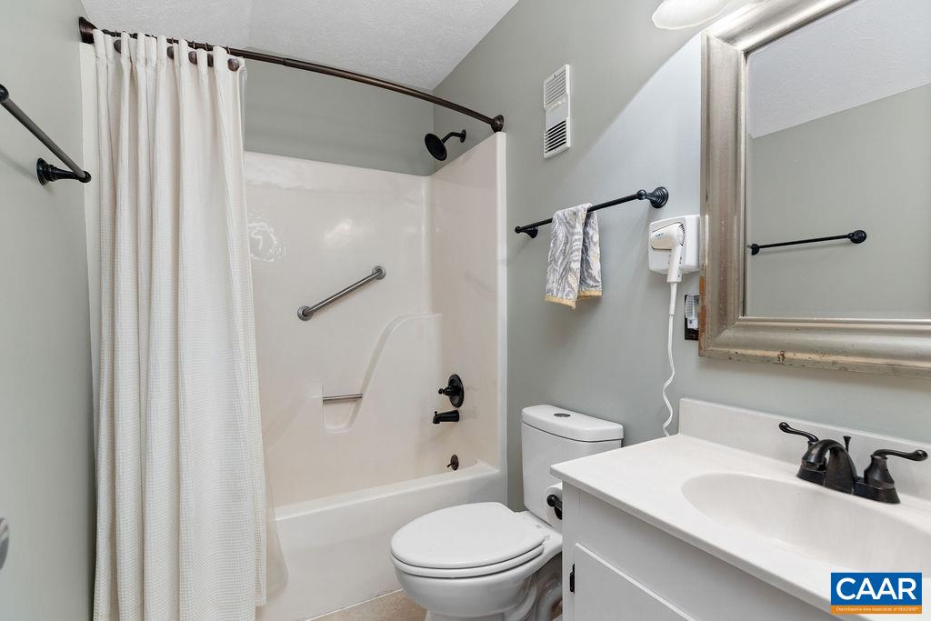 453 3 Ridges Roseland, VA 22967 - Photo 19 of 21 a bathroom with a sink toilet and shower