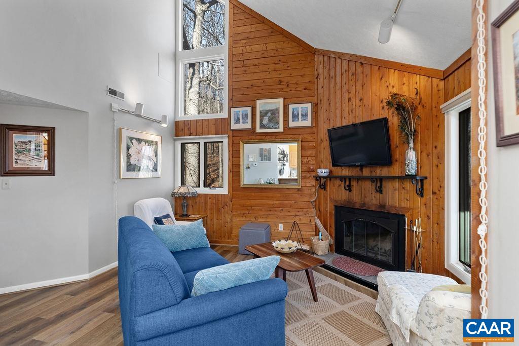 453 3 Ridges Roseland, VA 22967 - Photo 4 of 21 a living room with fireplace furniture and a flat screen tv