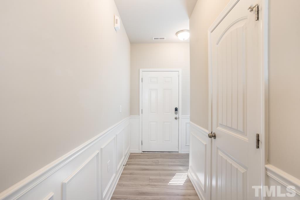 6801 Resting Grove Road Raleigh, NC 27610 - Photo 5 of 28 a view of a hallway