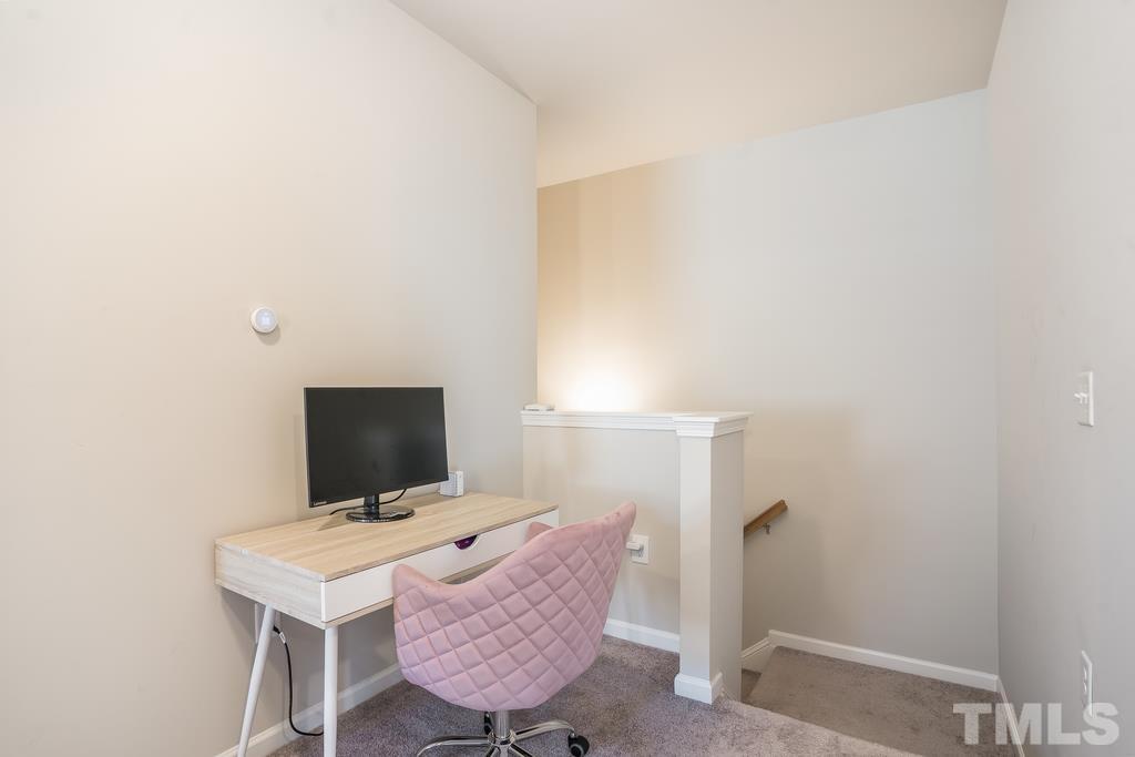 6801 Resting Grove Road Raleigh, NC 27610 - Photo 10 of 28 a view of a workspace with furniture